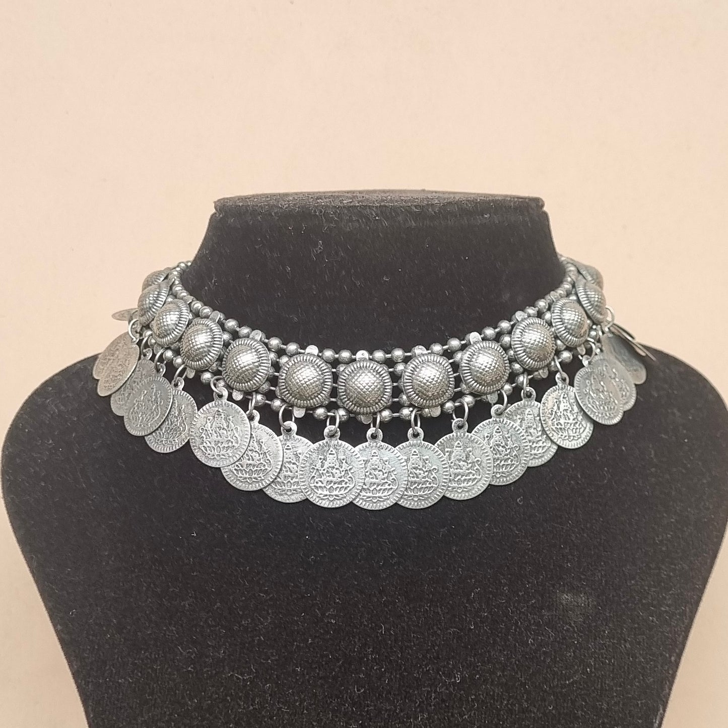 Coin choker