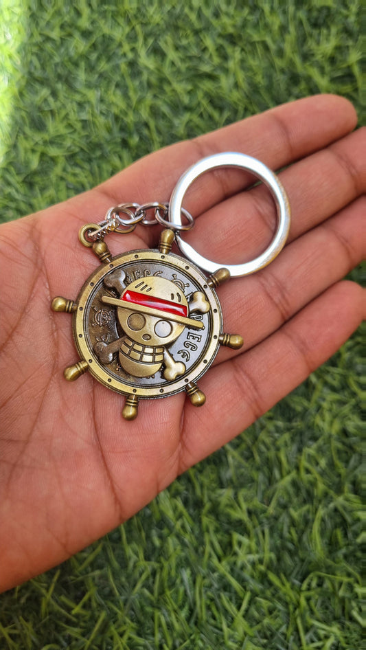 One-piece skull spinner keychain